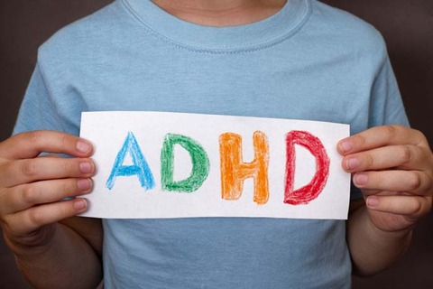 adhd-child-holding-notice