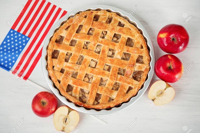 99477748-delicious-american-apple-pie-with-flag-on-table