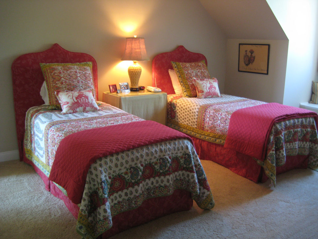 Twin beds with an exotic flair By Posh Living, LLC Twin beds with an exotic flair By Posh Living, LLC