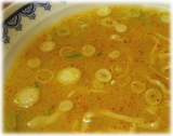 龍上海 赤湯からみそラーメンの味噌を混ぜた後のスープ