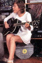 Kari Wuhrer guitar