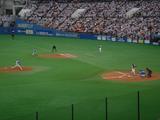 三塁打を放つ小坂