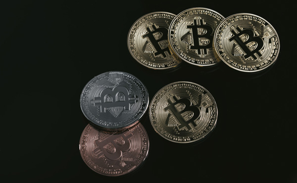 ビットコイン、処理速度向上で一致、規格分裂回避