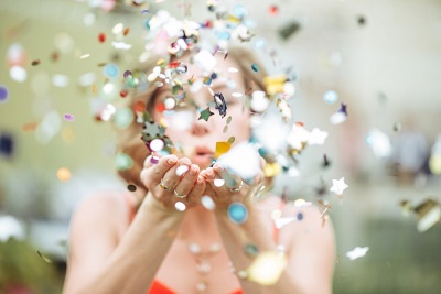 Girl-Blowing-Confetti