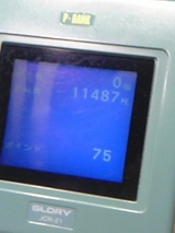 11487