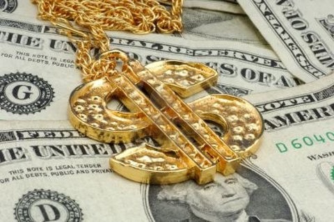 318619-gold-dollar-sign-necklace-and-money