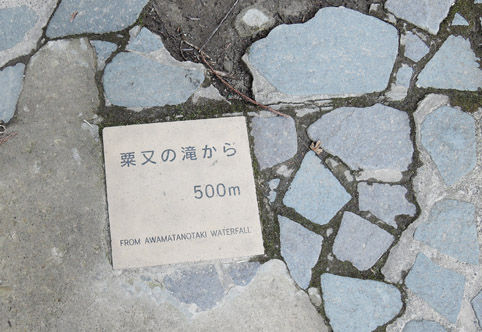 10610