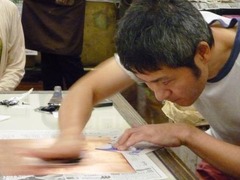 4薄紙でインクを拭き取る