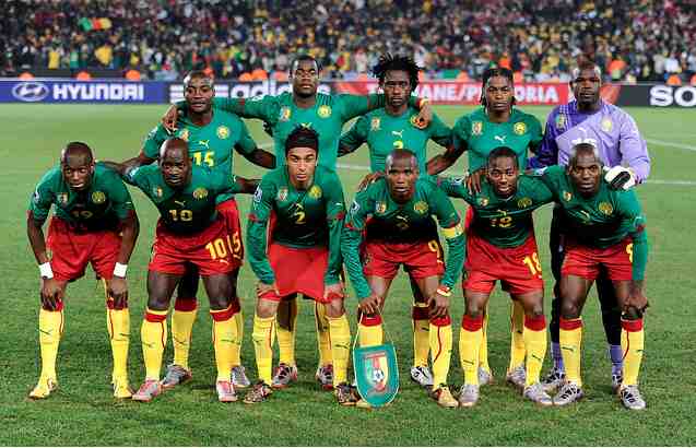 Image result for yellow red green football kit