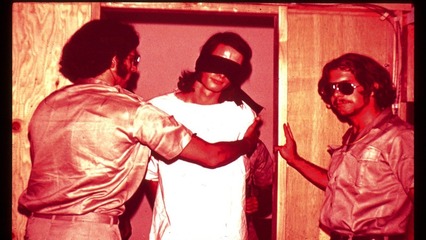 44-blindfolded.with_.guards-1-e1531641901305