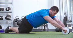 man-working-out-ab-roller-footage-056212399_iconm