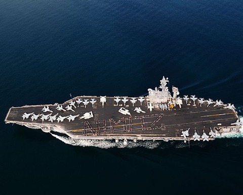Description: Sailors and more than 1,000 friends and family members spell out the word Nimitz aboard the aircraft carrier USS Nimitz (CVN 68) during the ship's 2010 Tiger Cruise. usnavy4