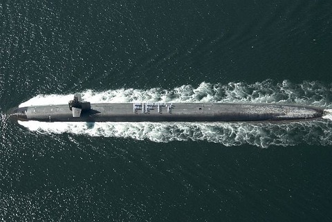 Description: Sailors assigned to the Ohio-class fleet ballistic missile submarine USS Pennsylvania (SSBN 735) spell out the word Fifty as they return to Naval Base Kitsap in the Navy Northwest Region. usnavy10