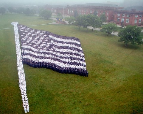 Description: In preparation for the 2011 Great Lakes Centennial, more than 7400 staff and students from Naval Station Great Lakes recreated the Living Flag from 1917 on National Flag Day at Ross Field. usnavy7