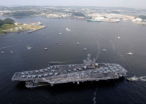 Description: Sailors aboard the aircraft carrier USS George Washington (CVN 73) form the phrase Hajimemashite, which means Nice to meet you in Japanese, as they arrive at Fleet Activities Yokosuka, Japan. usnavy1