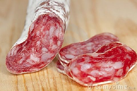 spanish-fuet-salami-cuts-wooden-board-10308344