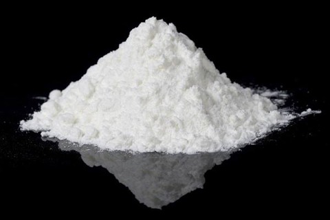 powdered-drug-on-black-counter