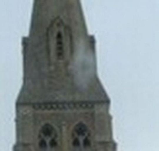 Close-up-of-the-unexplained-object-by-the-church-steeple