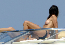Cindy Crawford black bikini - topless on yacht 3