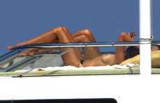Cindy Crawford black bikini - topless on yacht 7