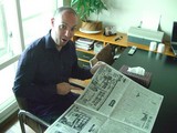 Pax reading news paper