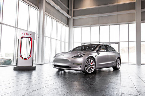 2017-Tesla-Model-3-front-three-quarter-charge-station