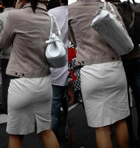 服が張り付いてパン線がでちゃった女性画像