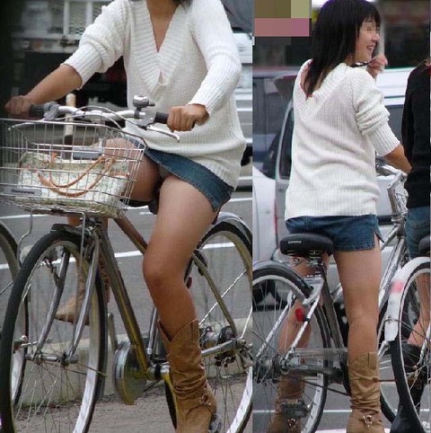 タイトスカートで自転車に乗ってるセクシーな女性画像