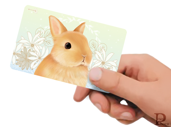 オレンジうさぎと白い花