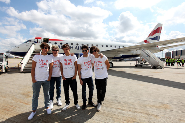 Boys in front of aircraft