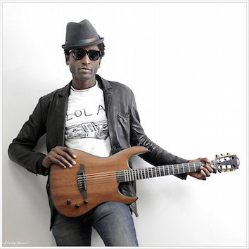 keziah_jones_and_his_new_lag_guitar____by_michelch-d4ib6yd