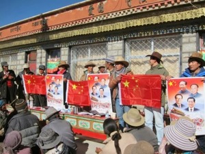 Tibetans-are-forced-to-raise-the-China-flag