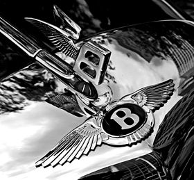 280px-Bentley_badge_and_hood_ornament-BW