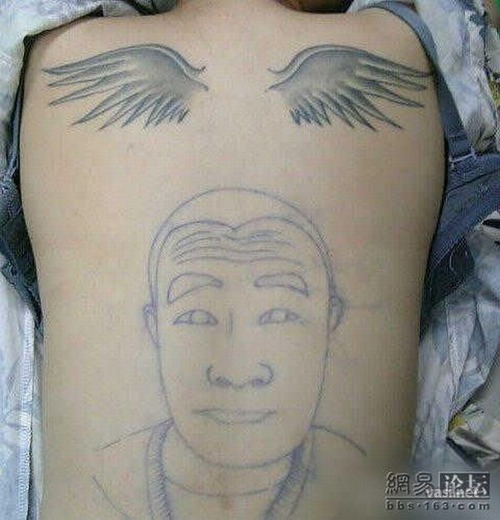 1245915761_tattoo_05