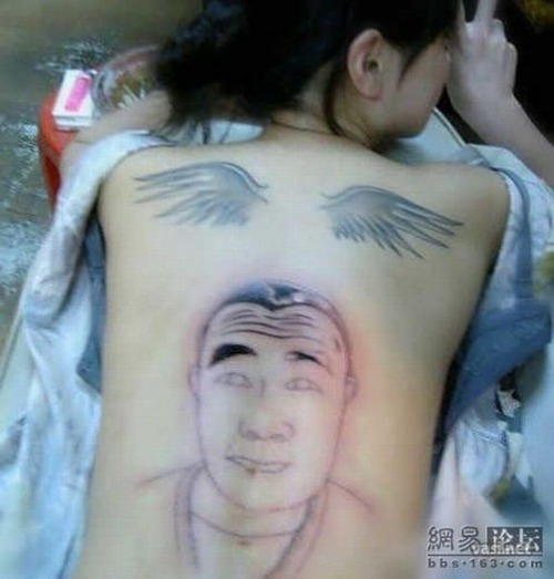 1245915761_tattoo_06