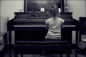Playing_the_Piano_by_brennaburk111805