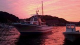 夕焼けと親父船
