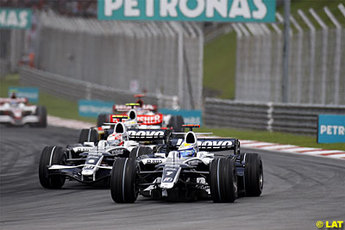 Nico Rosberg and Kazuki Nakajima