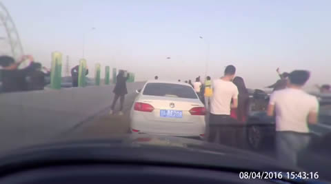 UFO Over China Freeway Makes Traffic Come To Stop