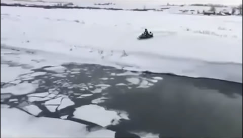Snowmobile fail river