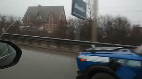 UFO Car Driving down Highway