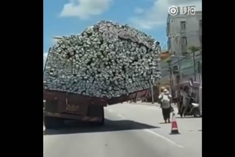 Truck with unbalanced load runs on road