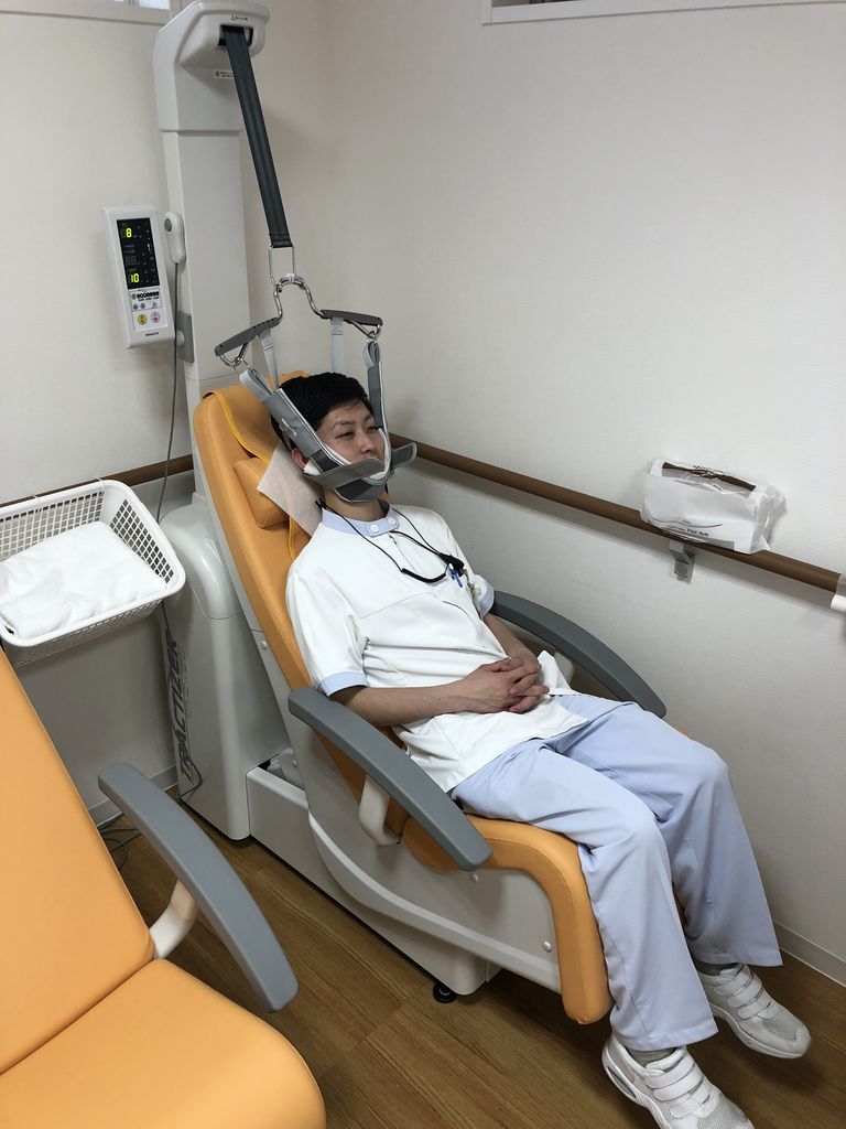 首 腰 牽引機 牽引器