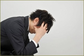 悩む男2
