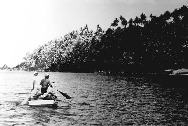 Small_boat_approaches_Anatahan_in_June_1950