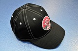 Triumph Live Cap