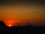 夕焼け飛行機雲2010.09.04.jpg