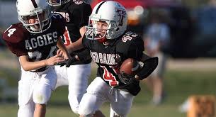 アメリカ人の小学生のアメフト選手