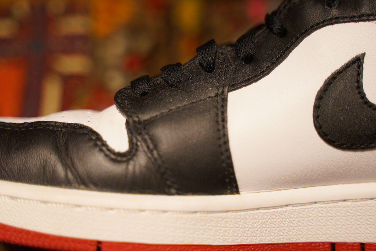 NIKE AIR JORDAN 1 RETRO HIGH OG “BLACK TOE REIMAGINED NIKE AIR JORDAN 1 RETRO HIGH OG “BLACK TOE REIMAGINED