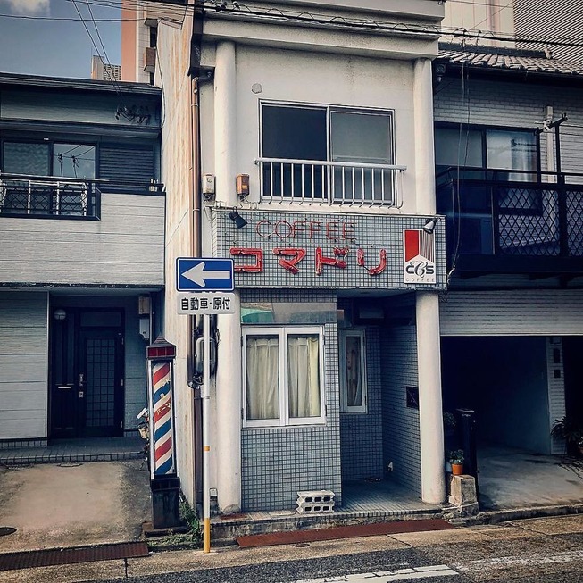 Man-still-enamoured-by-Kyotos-Small-Buildings-5be9413f5e07e__880